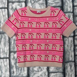 Juicy Couture piece featuring an all-over cherry and logo print
